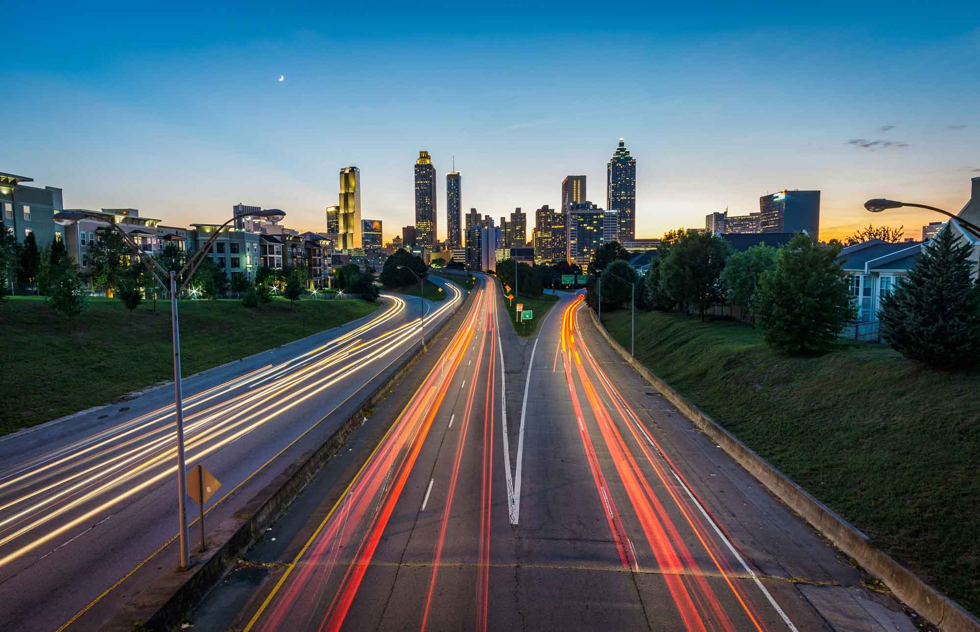 Timelapse photo of highway during golden hour. Photo by Joey Kyber on Unsplash